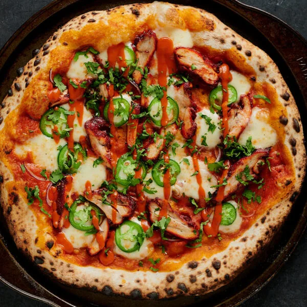 Delicious Butter Chicken Pizza at Pizza Milano & More in Edmonton, AB